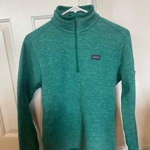 Patagonia greenish/blue quarter zip in good condition. Size medium.